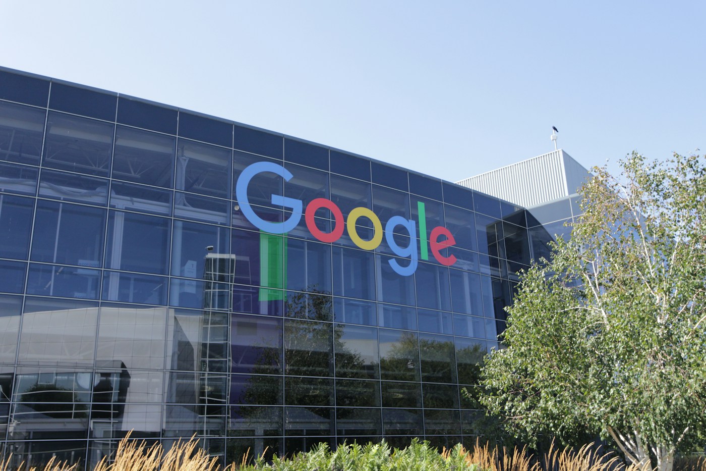 Google logo on a glass office building